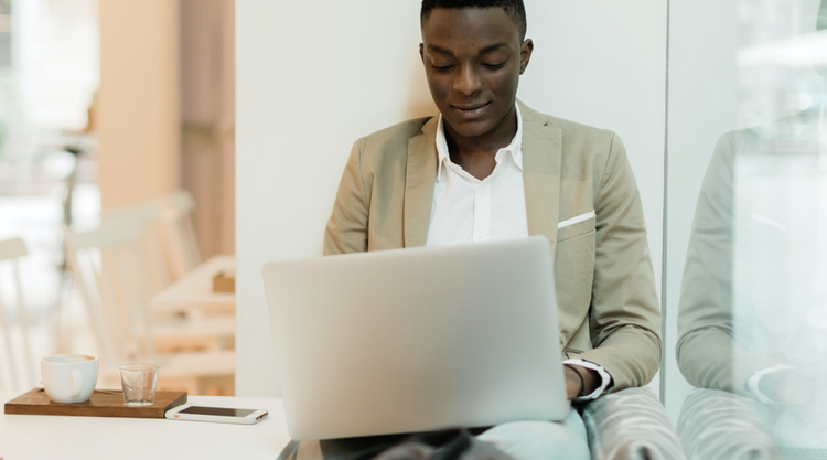 Business owner making a bill of sale on their laptop