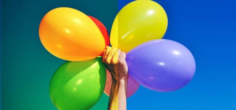 Image split in half with differences of altered coloration of a hand holding air filled balloons