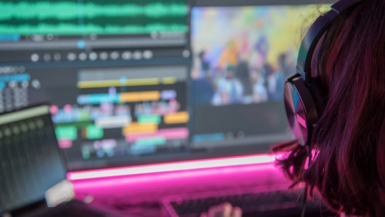 close-up of a person editing video footage in Premiere