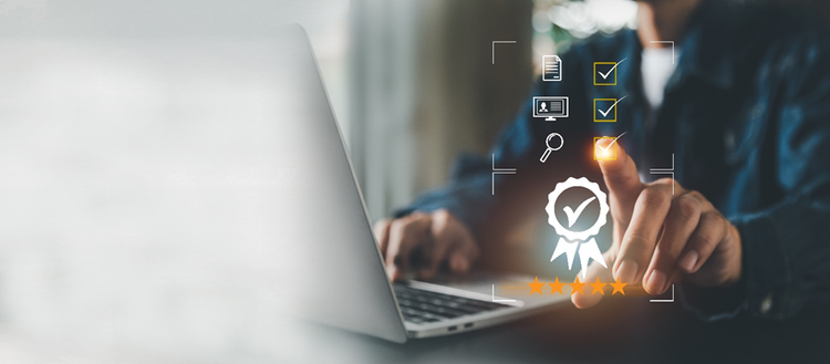 Man sitting working on a laptop. Overlaid with a conceptual diagram depicting quality checks and tick boxes.