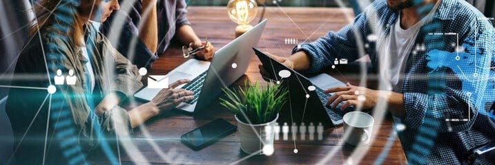 Three people sitting at a table with laptops and smartphones. overlaid with conceptual images of networking remotely with other people.