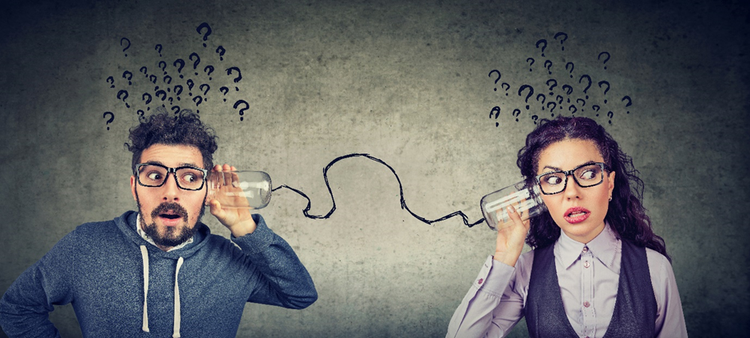 Photo of a man and a woman trying to listing to each other through glass cups connected with a piece of cord. Both have question marks written over their heads.