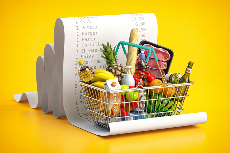 Photo of full shopping basket with groceries on top of an itemised receipt.