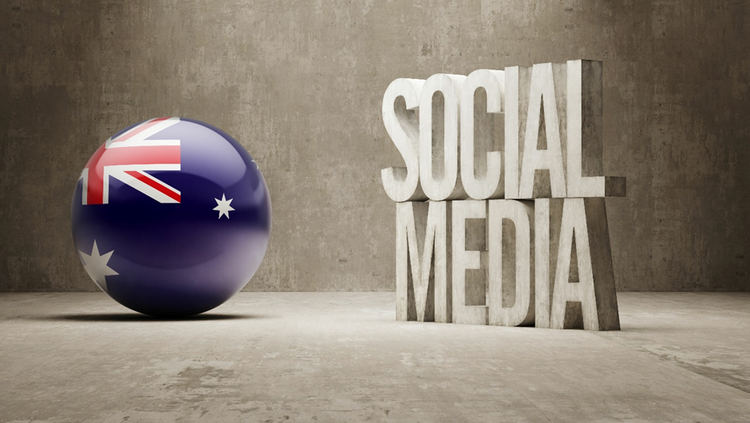 The words "Social Media" are depicted in block letters beside a ball painted with the Australian flag.