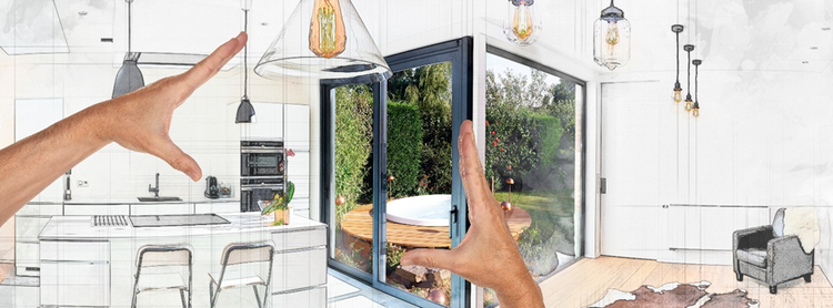 Image of a person's hands sizing up plans for a kitchen and living room, against an image showing an outside garden and landscaping.