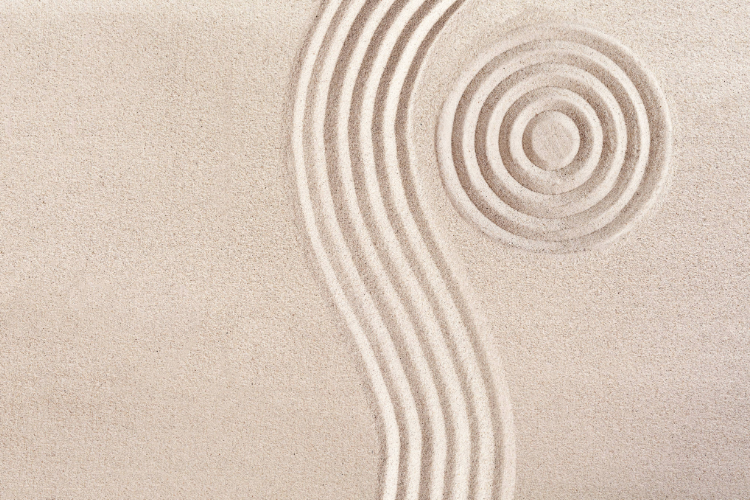 A sand with a swirl design Description automatically generated with medium confidence