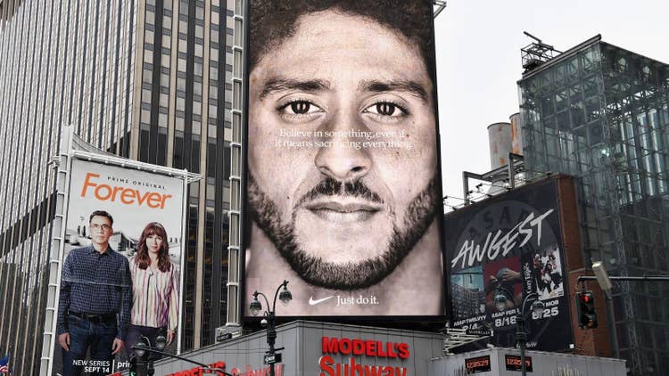 A billboard with a person's face Description automatically generated