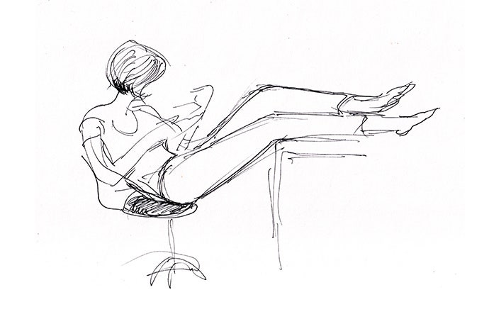 Rough sketch of a person with their feet up on their desk.