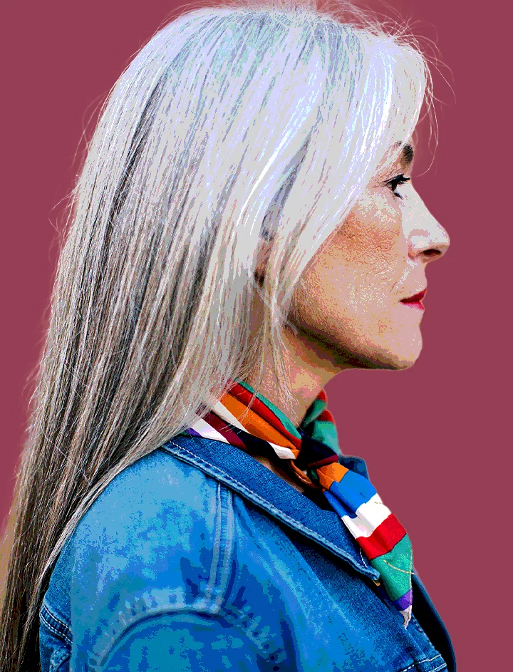 A posterized photo of a person's side profile