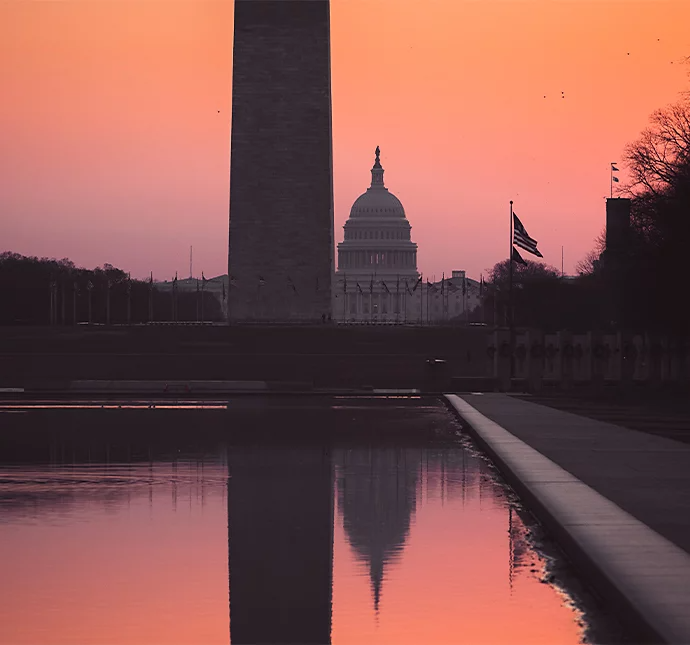 The Washington Monument and Capitol Building reflected in the Lincoln Memorial Reflecting Pool