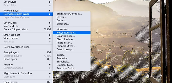 Hue/Saturation option selected using Adobe Photoshop menu