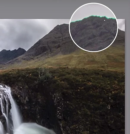 Highlighting chromatic aberration in a nature photograph of a waterfall