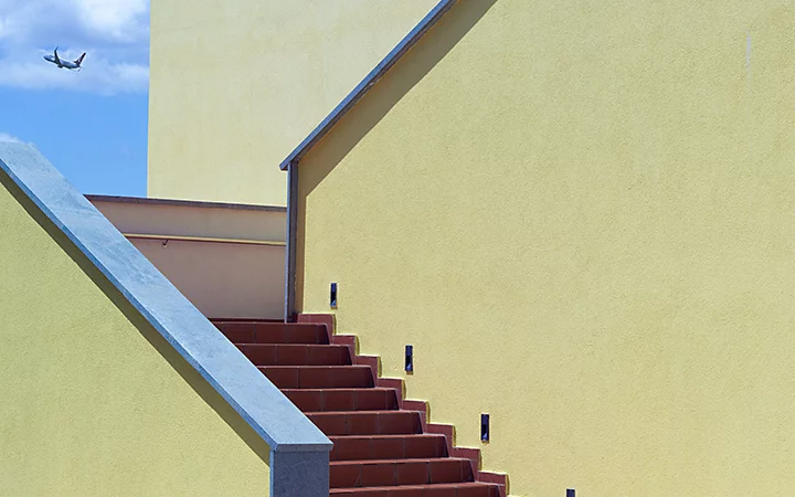 An outside metal staircase with geometric features