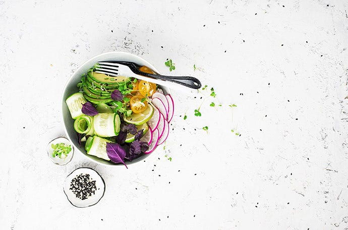 Uniquely sliced vegetables and fruit salad picture using the rule of thirds