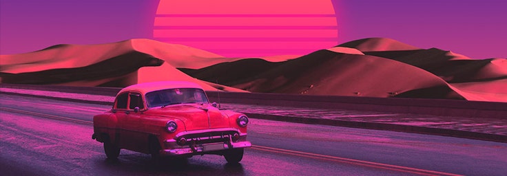 Retro car driving into the sunset
