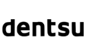 The plain-text logo for dentsu: black text in all-lowercase letters.