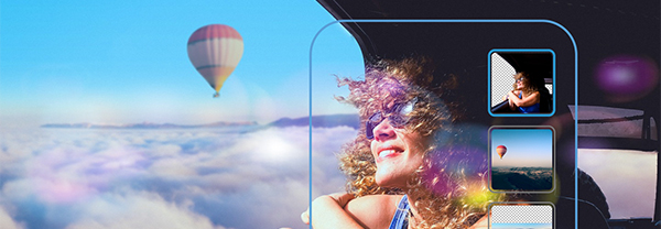 Photo of a smiling woman in a car looking out at a hot air balloon