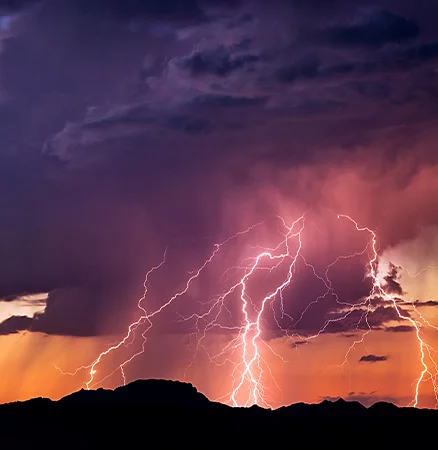 Bolts of lightning captured at sunset