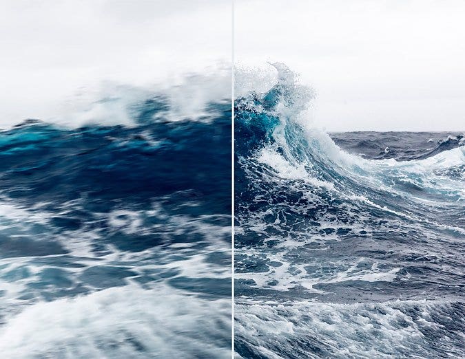 A photo of a moving wave with one side sharper and more clear than the other side.