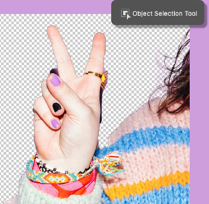 Close-up of a hand making the peace sign with the Object Selection tool chosen in Photoshop.