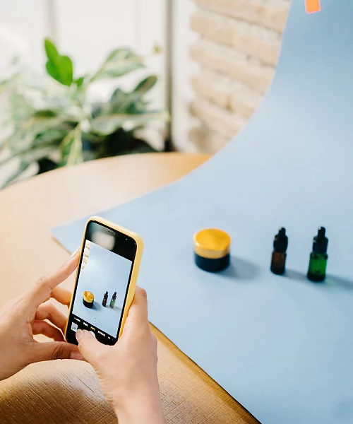 A product photoshoot using a backdrop.