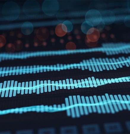 Close-up graphic of audio frequency waves with blue and red bokeh circles.