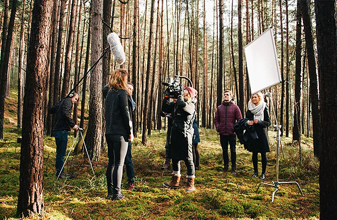 Production crew setting up a set outside