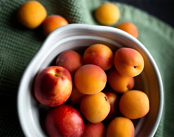 Close-up photo of a bowl filled with apples