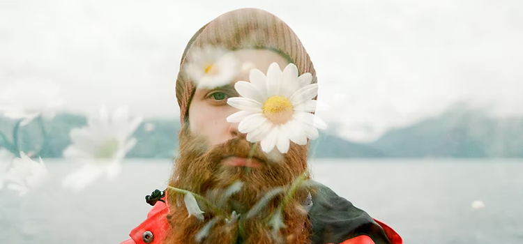 Flowers superimposed in front of a person's face in Photosho