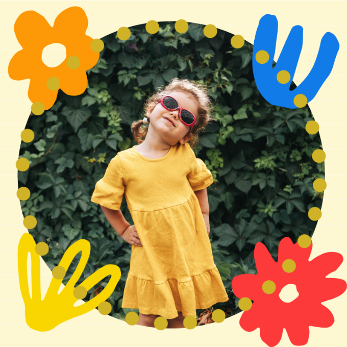 A child wearing sunglasses and posing for the camera Description automatically generated