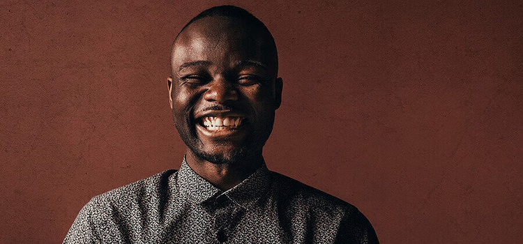 Portrait lighting pops the brilliant smile of an individual