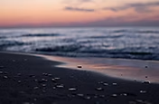 A beachside view at sunset