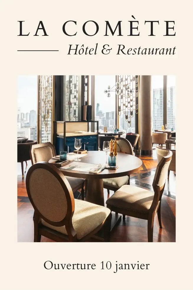A restaurant with a table and chairs Description automatically generated