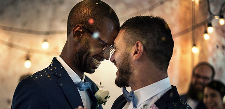 Newlyweds sharing a moment filled with love and joy during their first dance.