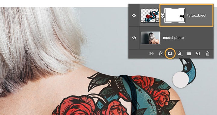 Add Photoshop mask to tattoo layer and brush to hide areas of tattoo that extend off the shoulder