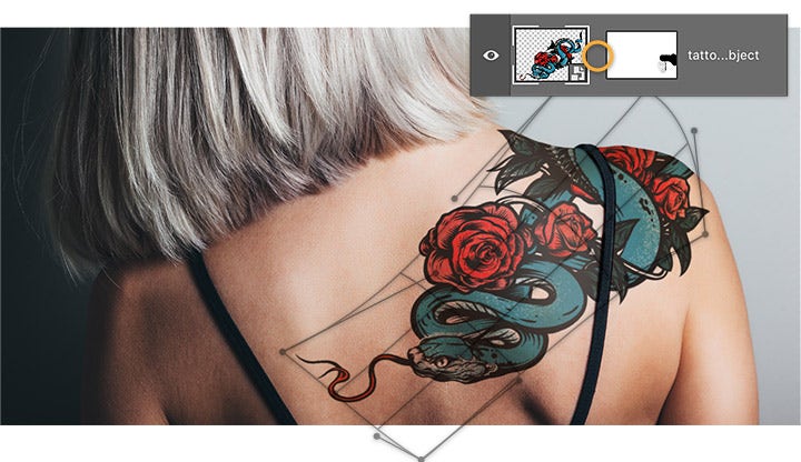 Use photo warp tools to fit image on to contours of the model’s back and shoulder