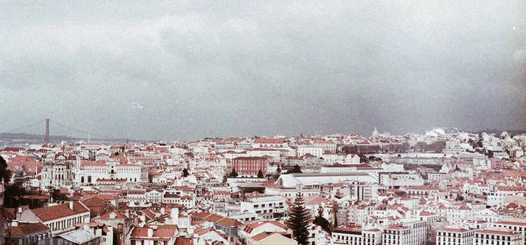 Photo of Lisbon city skyline with film grain