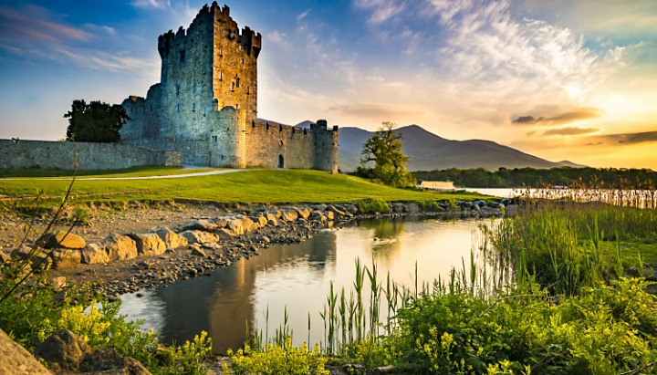 Ancient-old-fortress-ross-castle-ruin-with-lake-and-grass-in-ireland-during-golden-hour-nobody