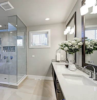 An interior photo of a master bathroom.