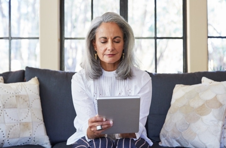 A patient reads over an informed consent form sent by their doctor before signing it in Adobe Acrobat Sign