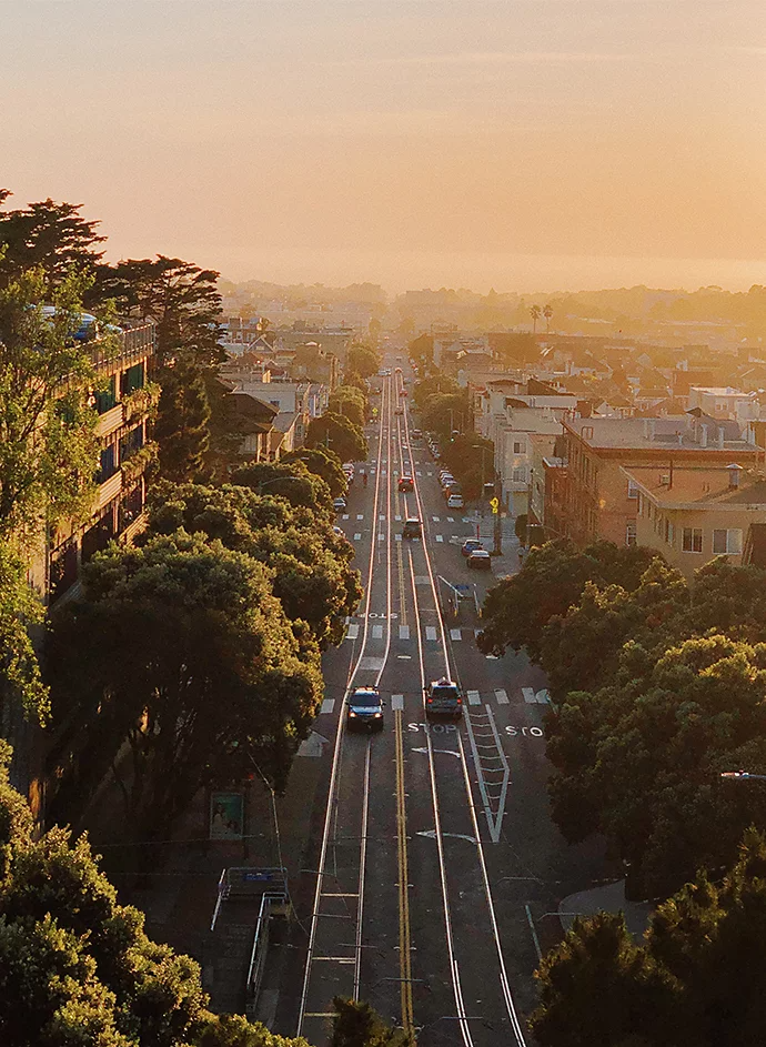 A bird's eye photo looking down a city street.