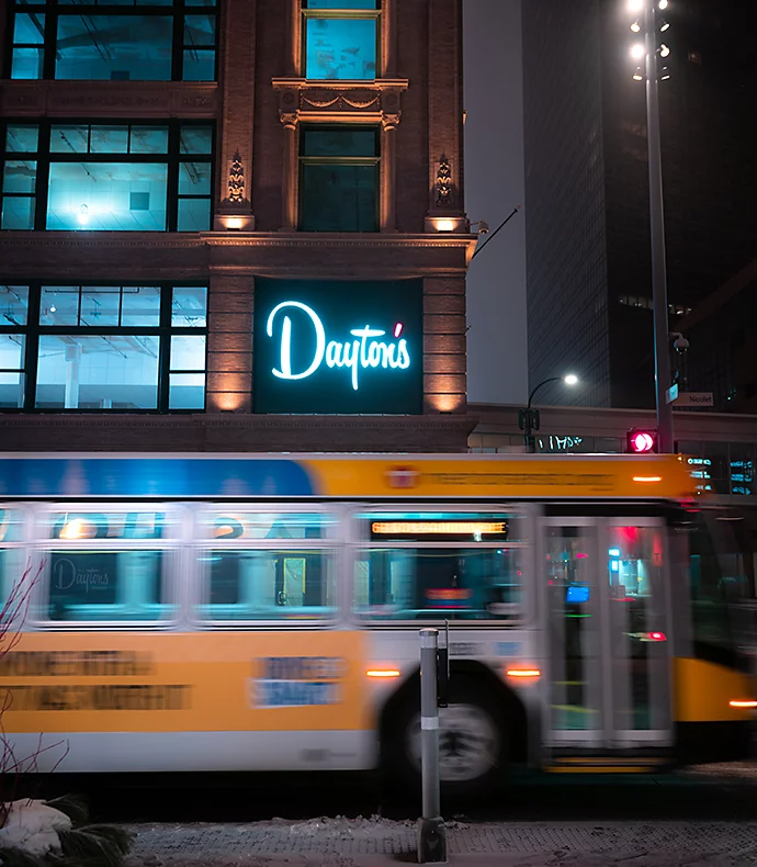 Motion blur photo of a bus driving into the shot