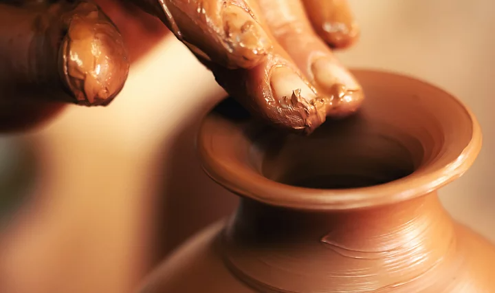 Close-up of making pottery with a Gaussian blur to the background