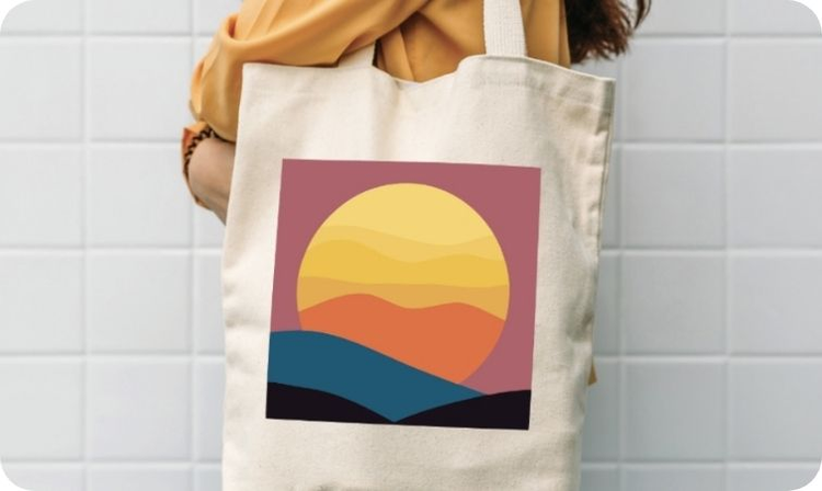Mockup of stylized sun and hills mocked up on a tote bag