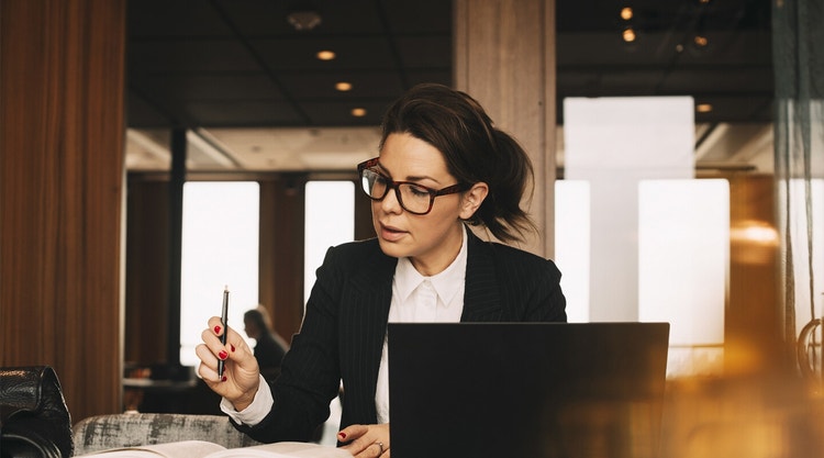 A person reviewing legal memos at their desk