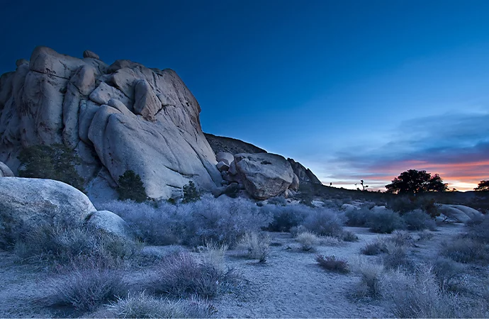 Night photo of Monument Valley boulders