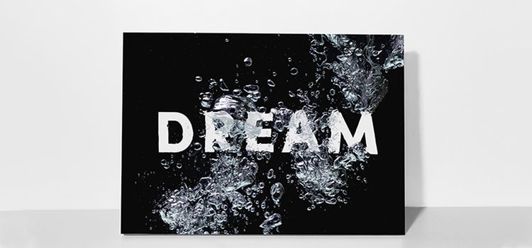 Graphic design of the word &quot;dream&quot; underwater.