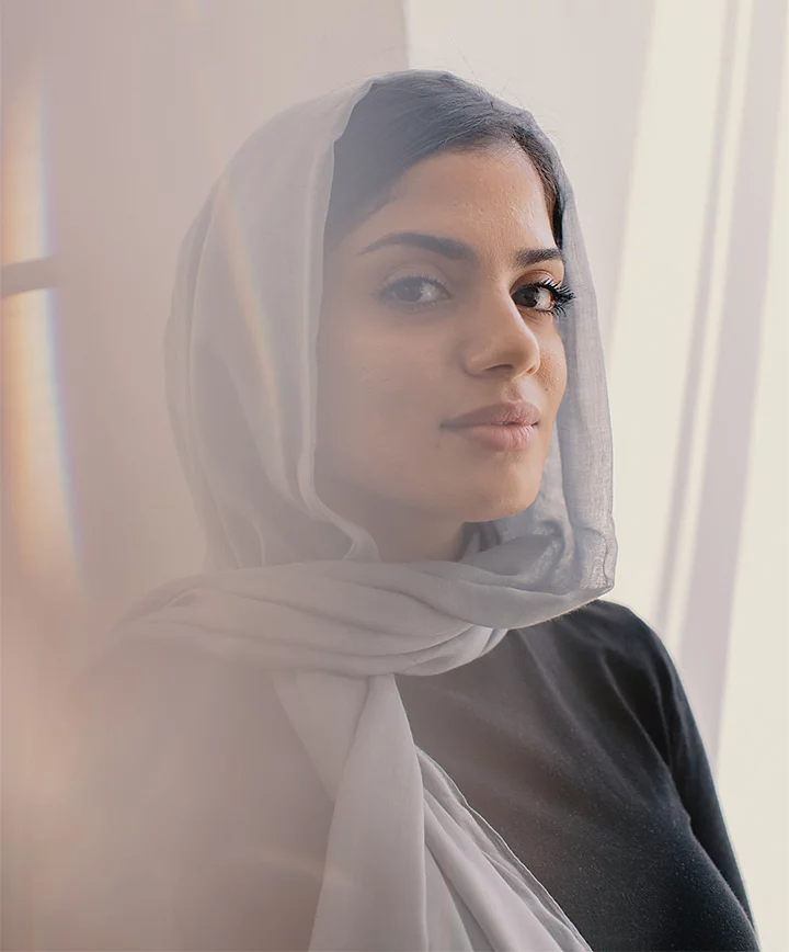 Diffused light used to take a portrait photo of a person posing