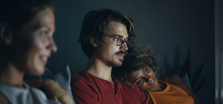 People on a couch watching a film with a 32 frame per second frame rate