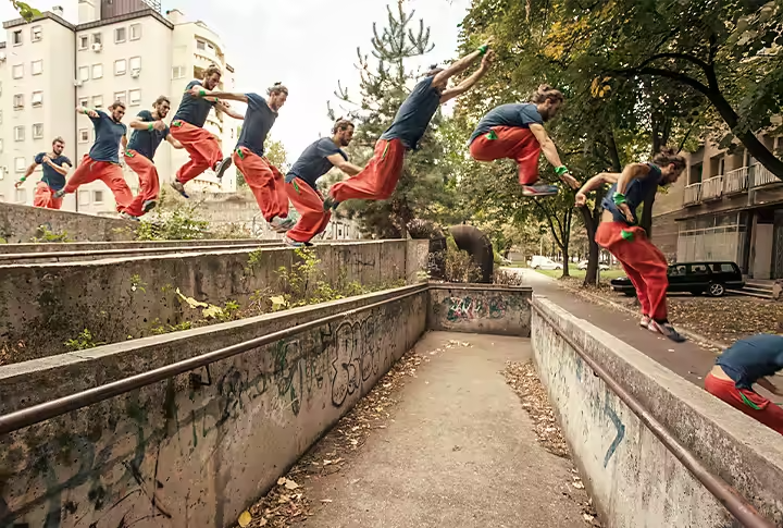 Time-lapse of someone jumping over a walkway